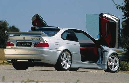 Hamann Competition szárny próbálja az útra szorítani a Laguna Seca hátulját