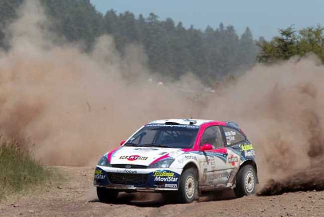 9965_81657_1000x700.jpg | Vezess | Vezess Martin defektje után magabiztos autózással őrizte első helyét Colin McRae