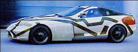 8822_77856_1000x700.jpg | Vezess | Vezess Egyértelműen felismerhető az álcázás ellenére az SLR. Szériában is felfelé-előre nyílnak majd az ajtók