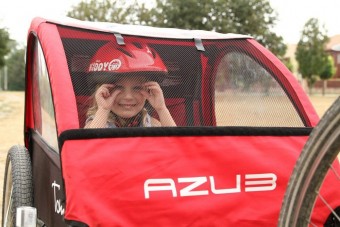 Ülés és utánfutó: gyermekszállítás kerékpáron