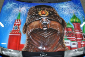 Bánatos Obama és kacsintó Putyin egy őrült Ladán