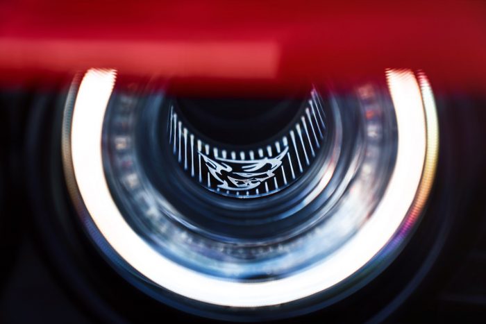 Száz fotón, két videón a világ leggyorsabb utcai autója 44 The 2018 Dodge Challenger SRT Demon’s driver-side functional Air-Catcher headlamp features a Demon logo.