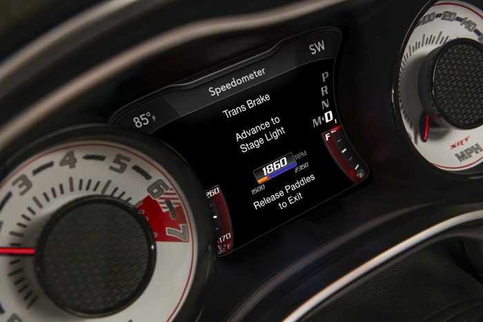Száz fotón, két videón a világ leggyorsabb utcai autója 60 The TransBrake launch screen on the 2018 Dodge Challenger SRT Demon’s 7-inch instrument cluster screen centered between the exclusive SRT Demon white face gauges.