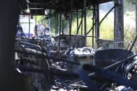 Fotókon az M1-M7-esen porrá égett busz 12