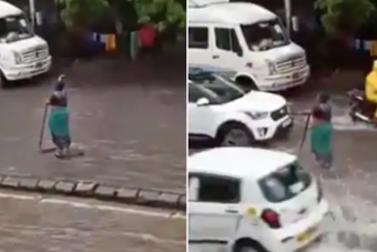 Öt órán át állt az elárasztott, veszélyes úton egy nő, és figyelmezette a közlekedőket