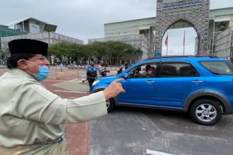 Tízezer autós előtt házasodtak Malajziában