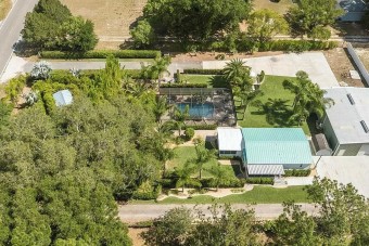 Ilyen házat vesz, akinek autói jelentik a családot