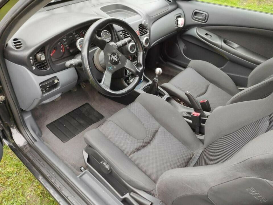 Olcsó, szürke átlagautó, de a motorháztető alatt komoly meglepetés lapul 4