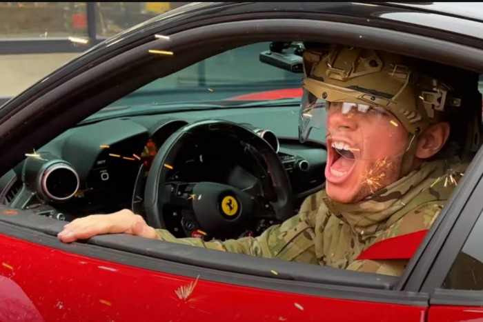 He deliberately humiliates and smashes the Ferrari, but many people are watching
