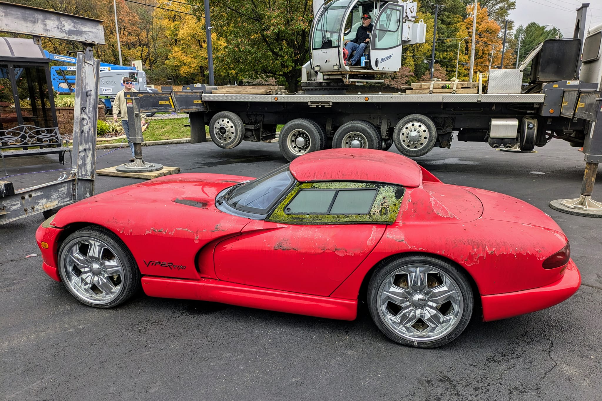 A fat new Dodge Viper 6 is stuck on a post that has been resting for 28 years