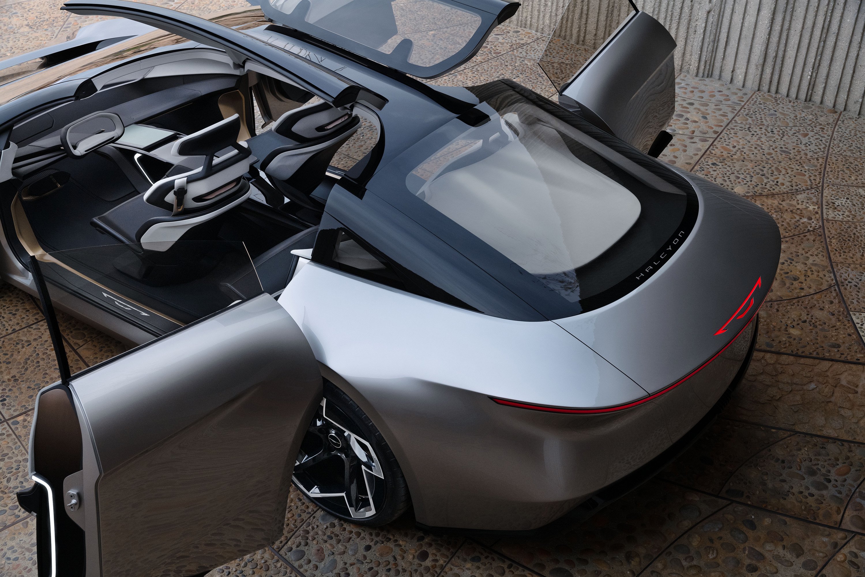 A warm Acrylic-tinted butterfly-hinged canopy serves as a third | Vezess | Vezess