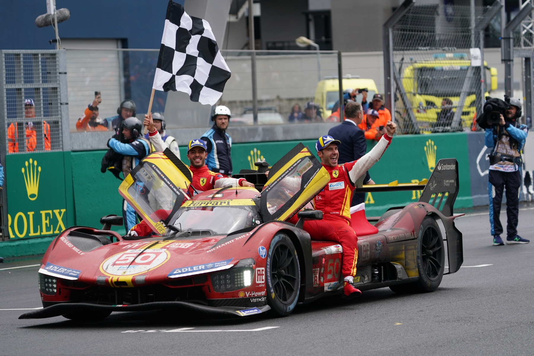 24 Hours of Le Mans 2024 - Race ---- #50 Ferrari AF Corse, Ferrari 499P: Antonio Fuoco (ITA), Miguel Molina (ESP), Nicklas Nielsen (DNK) are celebrating their win during the 24 Hours of Le Mans at the Circuit de la Sarthe in Le Mans, France, on June 16, 2024. (Photo by Alessio Morgese/NurPhoto via Getty Images) | Vezess | Vezess