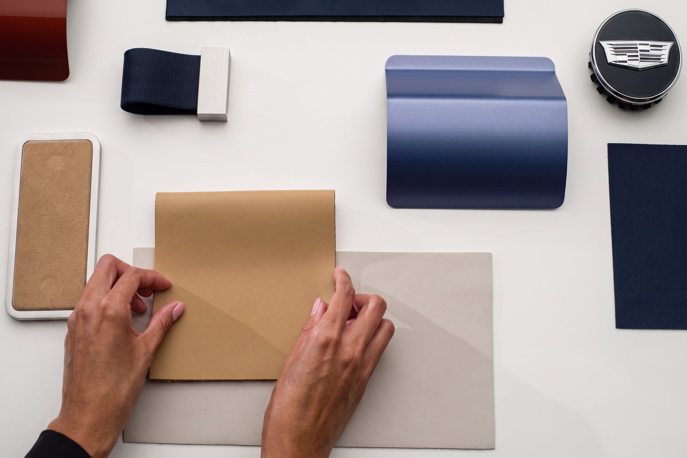 A sampling of design materials for the 2027 Curated by Cadillac | Vezess